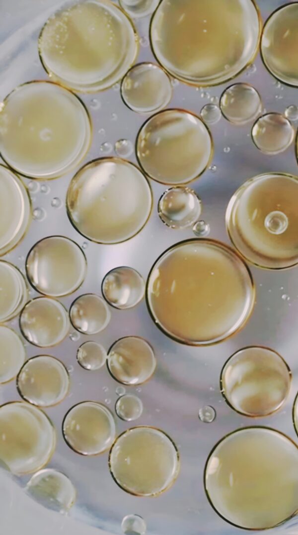 Drops of cacay oil, a natural active for skincare. This is an ethically sourced natural cosmetic ingredients from Latin America producer.